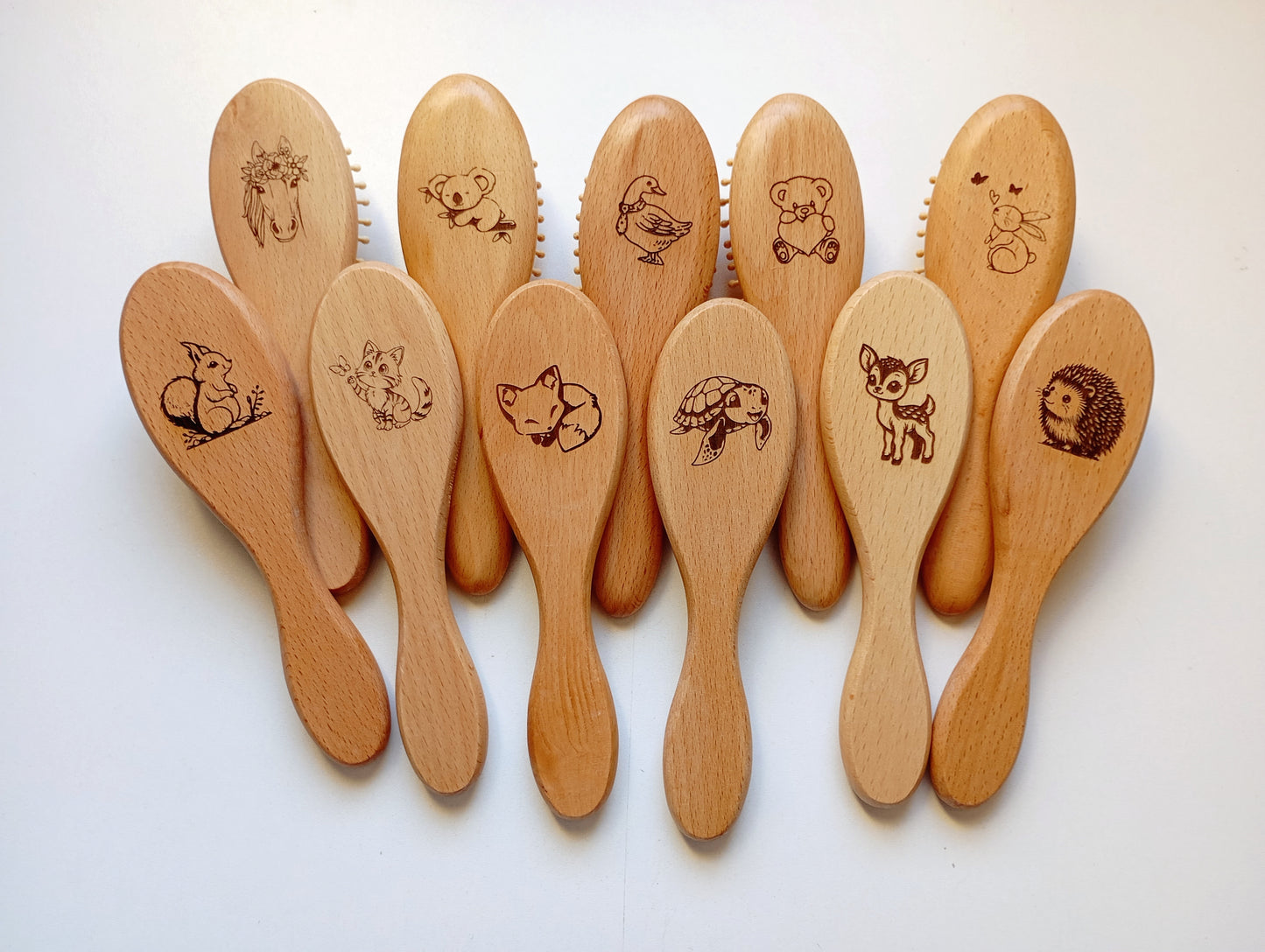 Brosse à cheveux picots en bois animal