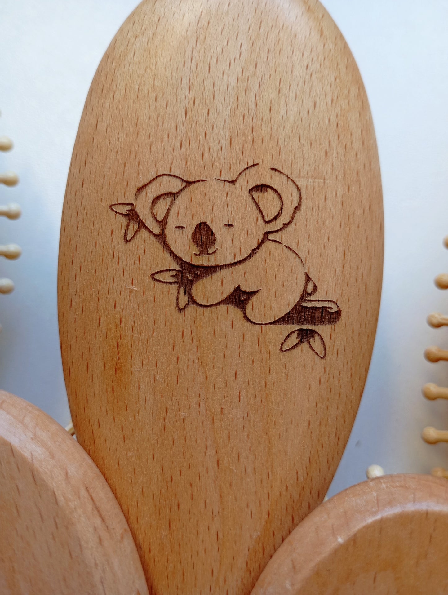 Brosse à cheveux picots en bois animal