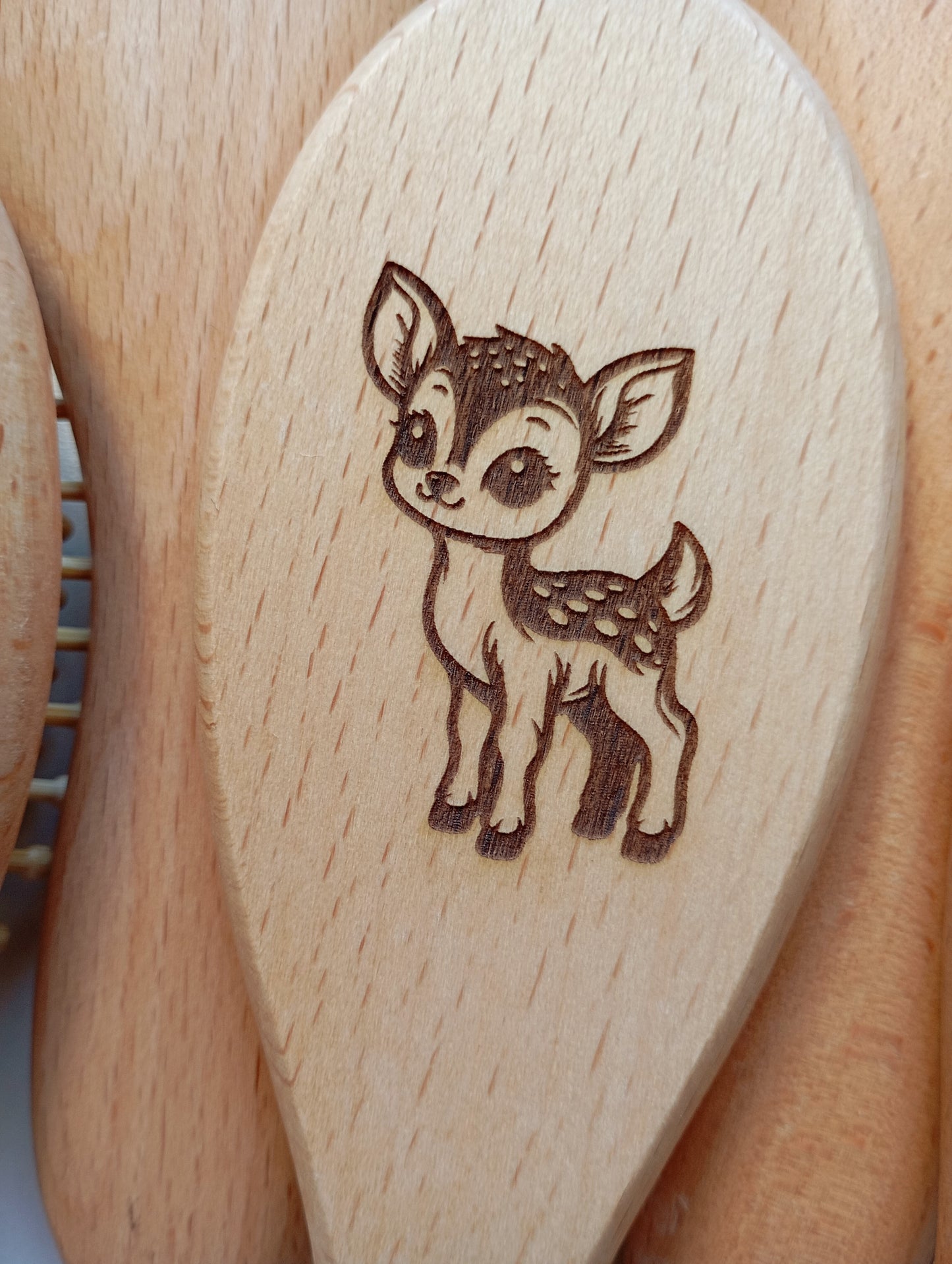 Brosse à cheveux picots en bois animal