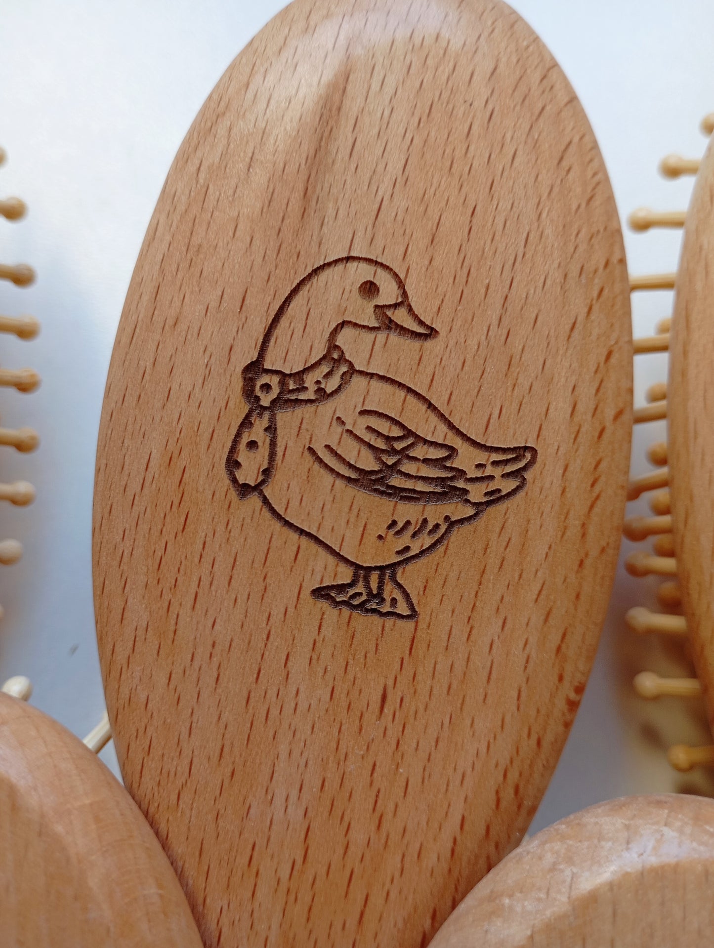 Brosse à cheveux picots en bois animal